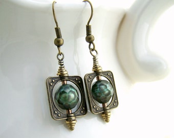 Faceted Green Pearl Earrings in antique brass bead frames - square saturn rings circle around faceted pearls - steampunk jewelry
