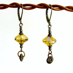 Black and Yellow earrings with spinning gears Gunmetal Steampunk earrings with misted yellow rivoli beads image 1