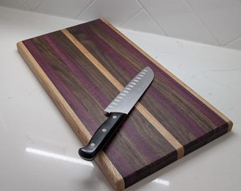Handcrafted Purpleheart and Walnut Cutting Board with Maple Accents