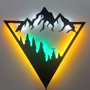 Insegna LED con silhouette di montagna, decorazione da parete illuminata con natura per camera da letto, ufficio, cabina o soggiorno, regalo per amanti dell'aria aperta.