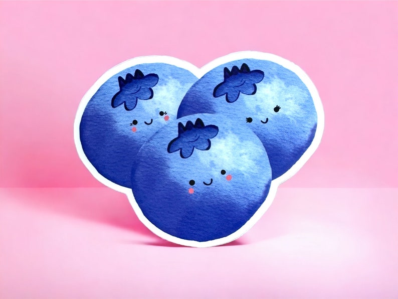 May include: Three blue blueberries with white outlines and happy faces. The blueberries are painted in a watercolour style.