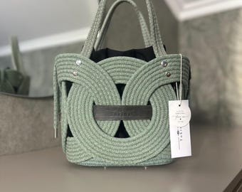 Groene katoenen touwtas, knooptas met leren handvat, minimalistische schoudertas