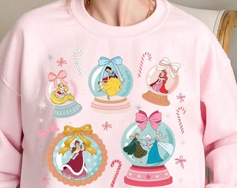 Comfort Colors® Coquette Bow Disney Princess Christmas Sweater, Christmas Party, Frozen Elsa Anna Olaf Belle Rapunzel Disney Girl Trip Tee