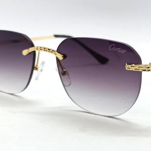 Cartier Purple Gradient Lens Rimless Sunglasses