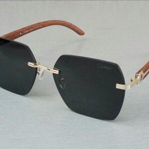 Cartier Black Lenses Rimless Women's Fashionable Sunglasses
