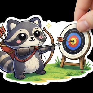 May include: A sticker featuring a cartoon raccoon aiming a bow and arrow at a target. The raccoon is gray, black, and white, with a red quiver and strap. The target is round with concentric colored rings. The background is green grass and a black backdrop.