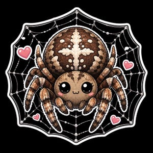 May include: A sticker featuring a brown and tan spider with large black eyes and pink cheeks, positioned in the center of a white spider web. Four small pink hearts are placed around the spider against a solid black background.