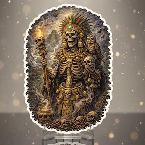 May include: A detailed sticker featuring a skeletal figure adorned with a feathered headdress, holding a staff with a flaming skull. An owl sits on the figure's shoulder. The design includes skulls and intricate gold detailing, set against a smoky background.