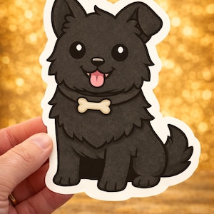 Puede incluir: Una pegatina de perro de dibujos animados negro con una etiqueta de collar en forma de hueso. El perro tiene una apariencia esponjosa, una lengua rosada y ojos grandes y expresivos. La pegatina se sostiene contra un fondo dorado y brillante.
