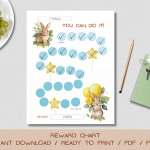 Op de afbeelding: Een afdrukbare beloningskaart met een aquarel konijn illustratie. De kaart heeft selectievakjes, stericonen en de tekst "YOU CAN DO IT!" en "PUPPY". Een potlood en een groen notitieboekje staan rechts.