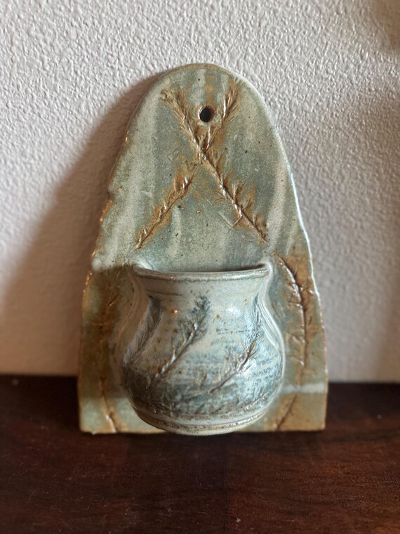 Embossed light green ceramic wall pocket | ceramic wall basket | studio pottery organizer | handmade wall planter | small wall hanging