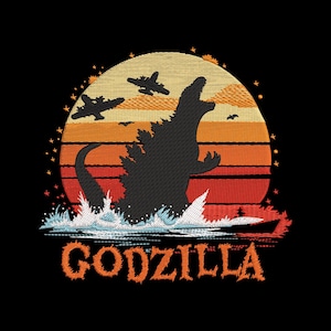 May include: An embroidered design on a black background featuring a black silhouette of Godzilla rising from white ocean waves. Behind the creature is a circular sunset in orange and yellow stripes with two airplanes and the text GODZILLA below.