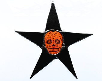 Dia de los Difuntos- 9.5 inch stained glass star with 3 inch skull center, Dia de los Difuntos or Day of the Dead- Orange stained glass