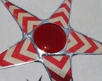 Zig-Zag Star--Chevron lacquered paper on glass with red glass cabochon