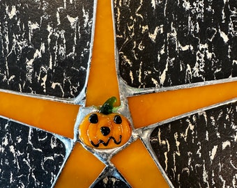 A  5" Glass Jack-O-Lantern Star