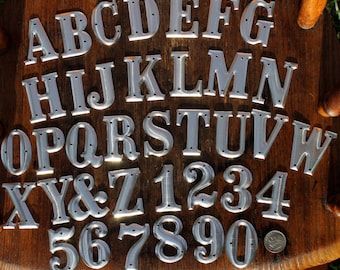 1.5 inch Metal Letters and Numbers- One and one half inch high aluminum letter/number listing for ONE letter/number NOT the entire alphabet.