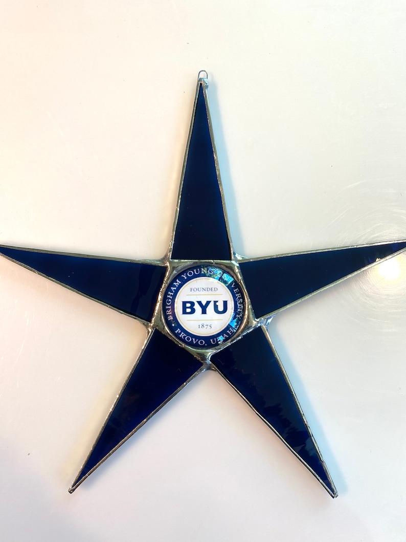 Team Star 9.5 inch art glass star with Team logo lacquered under glass cabochon center image 1