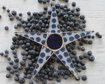 Blueberry Skies star- 10 inch lacquered fabric under glass with cobalt art glass center