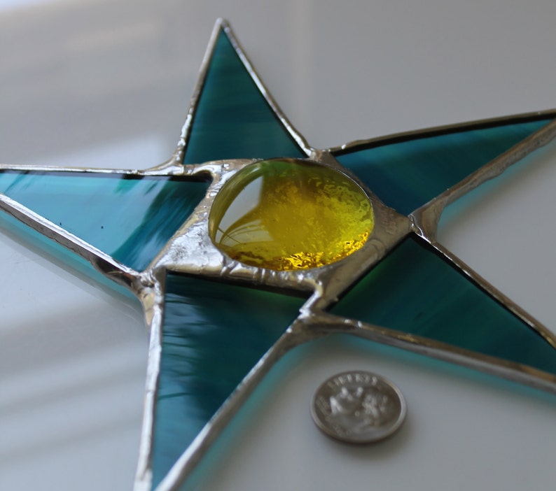 Terri 7 inch stained glass star with teal points and lemon yellow center image 3