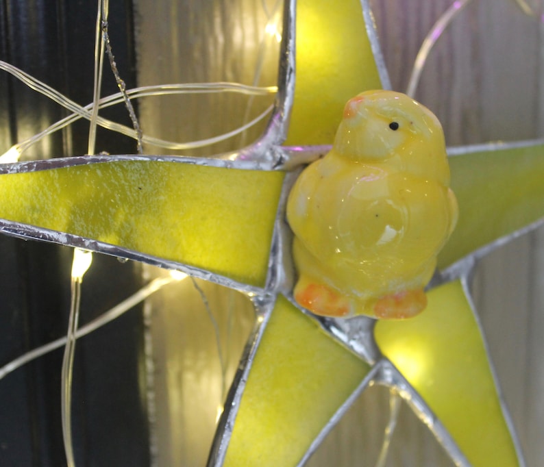 listing for one Chick Star 1 7 inch stained glass star with ceramic chick star