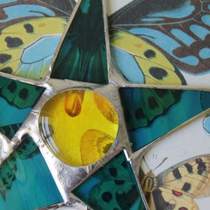 Terri 7 inch stained glass star with teal points and lemon yellow center image 2