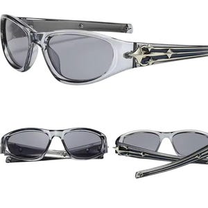 May include: Clear frame sunglasses with dark gray lenses and a silver and black decorative detail on the arms.