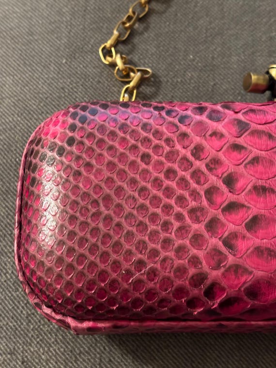 fuchsia-colored python-embossed  clutch with a go… - image 3