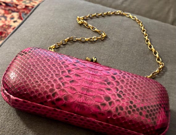 fuchsia-colored python-embossed  clutch with a go… - image 6