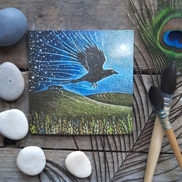 The Starbringer Greetings Card by Hannah Willow. Featuring Crow Flying Across an Open Land.