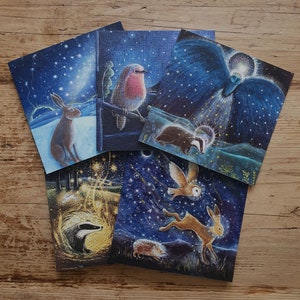 Kerstliedjes wenskaart Set van 5 kaarten van Hannah Willow, inclusief dassen, uilen, hazen, egels en roodborstjes met een kerstthema