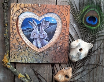 Valentine Hare Greetings Card by Hannah Willow Two Hares in a golden Heart