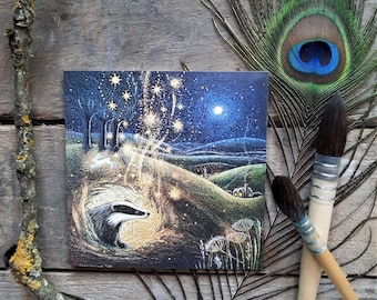 May include: A whimsical illustration of a badger standing in a glowing circle of light, surrounded by a starry night sky. The scene is set in a forest with trees and hills in the background.
