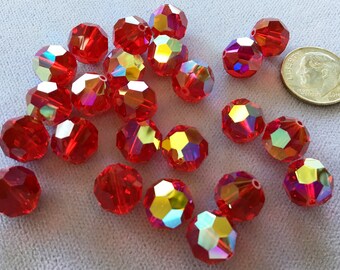 Twenty-four (24) 10mm SIAM RED AB Round Swarovski Crystals Style 5000