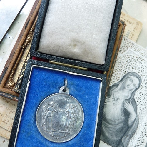 Antique French Angel Communion shops Medal, Sacred Treasure from the Past, offered by RusticGypsyCreations