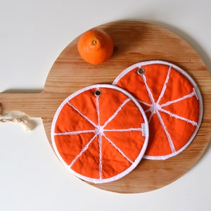 round orange kitchen potholders - citrus orange fruit kitchen gift idea - foodie gift - hostess gift - fun housewarming gift