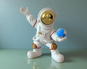 Astronaut Holding Earth Statue – Space Decor Figurine for Desk, Office, or Home