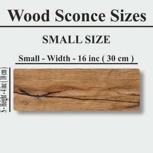 Peut inclure: Image pr&eacute;sentant les dimensions d'une petite applique murale en bois. Le texte indique les dimensions : 40 cm de large et 10 cm de haut. L'applique est rectangulaire, avec un motif de grain de bois naturel et des lignes sombres.
