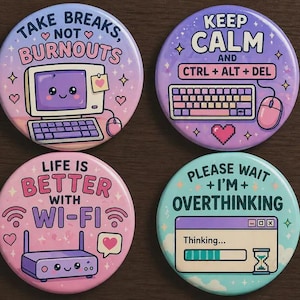 May include: Four round, colorful buttons with tech-themed designs. One says "Take Breaks, Not Burnouts" with a computer graphic. Another says "Keep Calm and Ctrl+Alt+Del" with a keyboard. The others say "Life is Better with Wi-Fi" and "Please Wait + I'm + Overthinking."