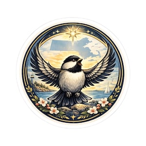 May include: A round sticker featuring a black-capped chickadee with outstretched wings, set against a coastal scene with a lighthouse and sailboat. The bird is surrounded by a floral border and a starburst.