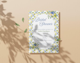 May include: A white bridal shower invitation with a blue and yellow floral border. The text reads "Bridal Shower" and "Please join us to celebrate our bride-to-be Violet Davidson". The date and time are July 15th at 4:00 PM and the location is 8255 Parkside, Chicago, IL 60626.