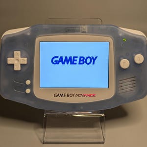 Gameboy Advanced (GBA) IPS backlit screen mod. Modded console. Glacier blue and white. New speaker, screen, & body. Original motherboard.
