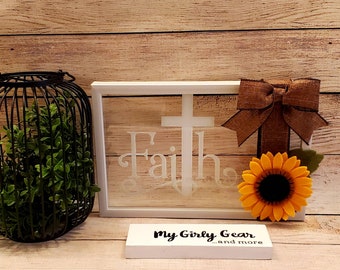 Faith sign felt sunflower white framed glass sign the word Faith with a cross as the T wrapped with ribbon and bow on one side 11×7 inch