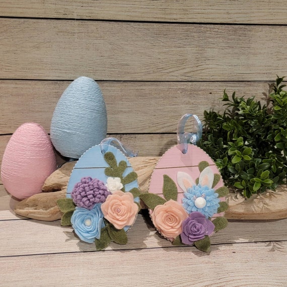 Spring wood slat egg ornament set with handmade felt flowers pink and blue eggs with felt flowers in pink, blue white and purple