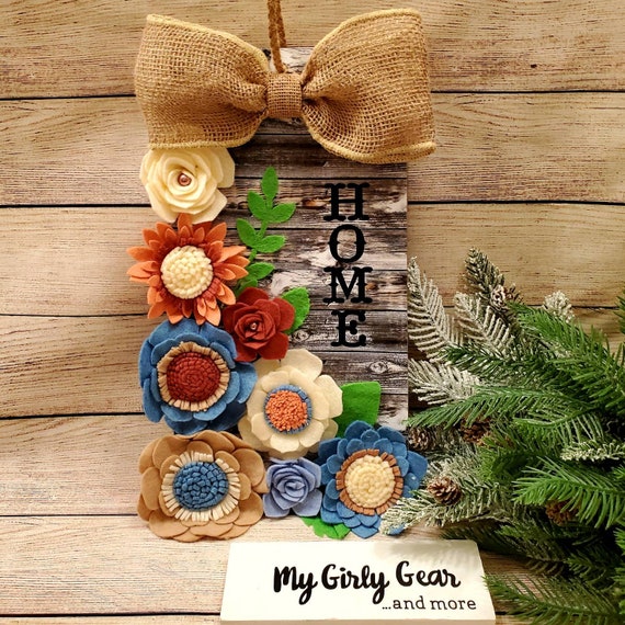 Wood Home sign tag shaped felt flowers decoupaged w/ wood look paper, filled w/ handmade felt flowers and backed with felt and twine hanger