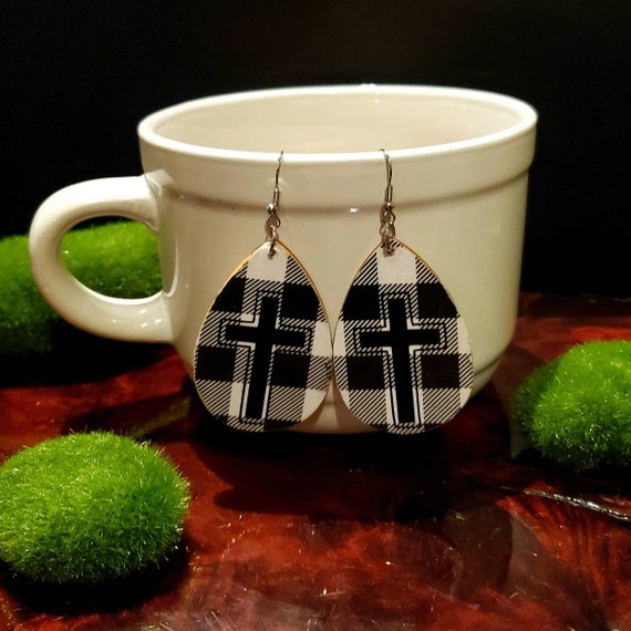 Buffalo check cross teardrop shaped wood slice earrings in black and white plaid check with a black cross outline