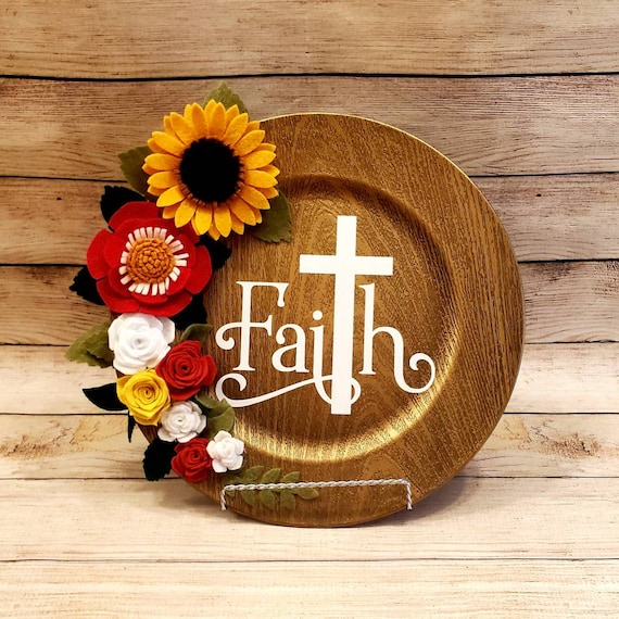 Felt sunflower and Faith on wood look charger plate sign. Handmade felt flowers Large charger plate can sit in a stand or hang on wall.