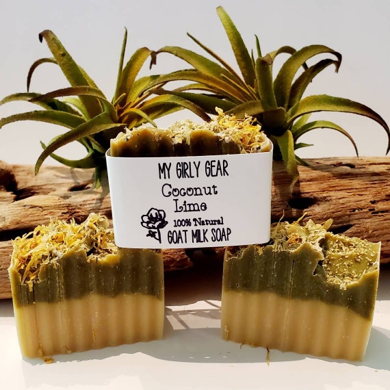 Coconut Lime goat milk bar  soap W/ spuralina, kaolin clay and scented w/ essential oils and citrus zest. All natural cold process handmade