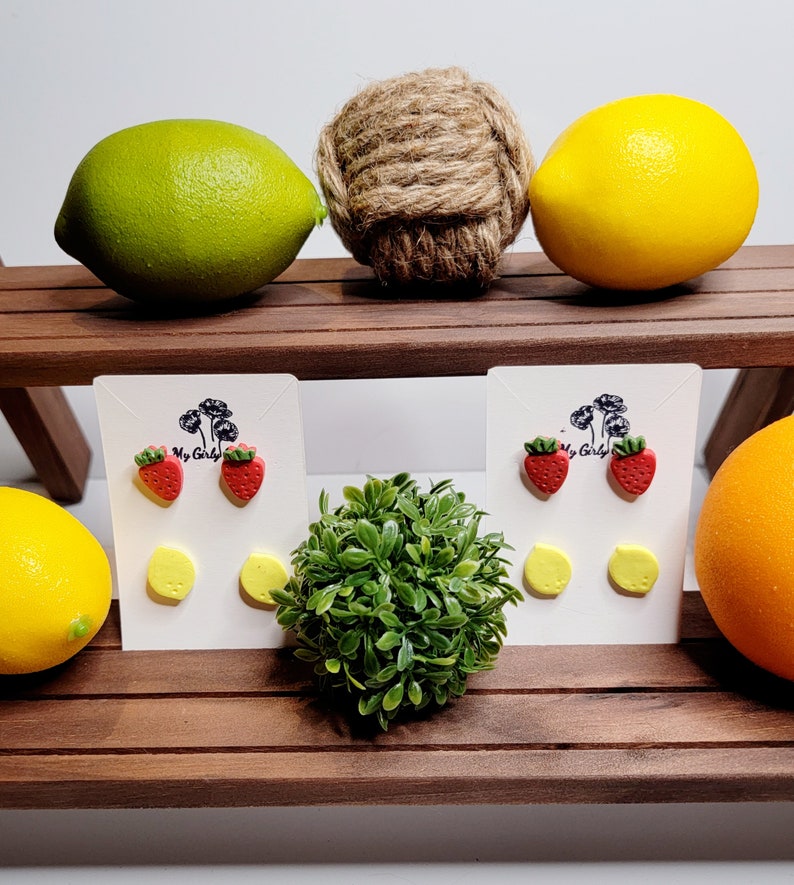 Pair of fruit stud post set, red strawberry earrings and yellow lemon earrings. Surgical steel posts. image 1