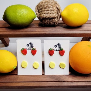 Pair of fruit stud post set, red strawberry earrings and yellow lemon earrings. Surgical steel posts. image 2