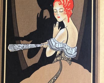 May include: Art Deco illustration of a woman with red hair and a tan dress. The woman is holding a decorative object. The background features a dark shadow and geometric shapes. The artwork has a vintage aesthetic.
